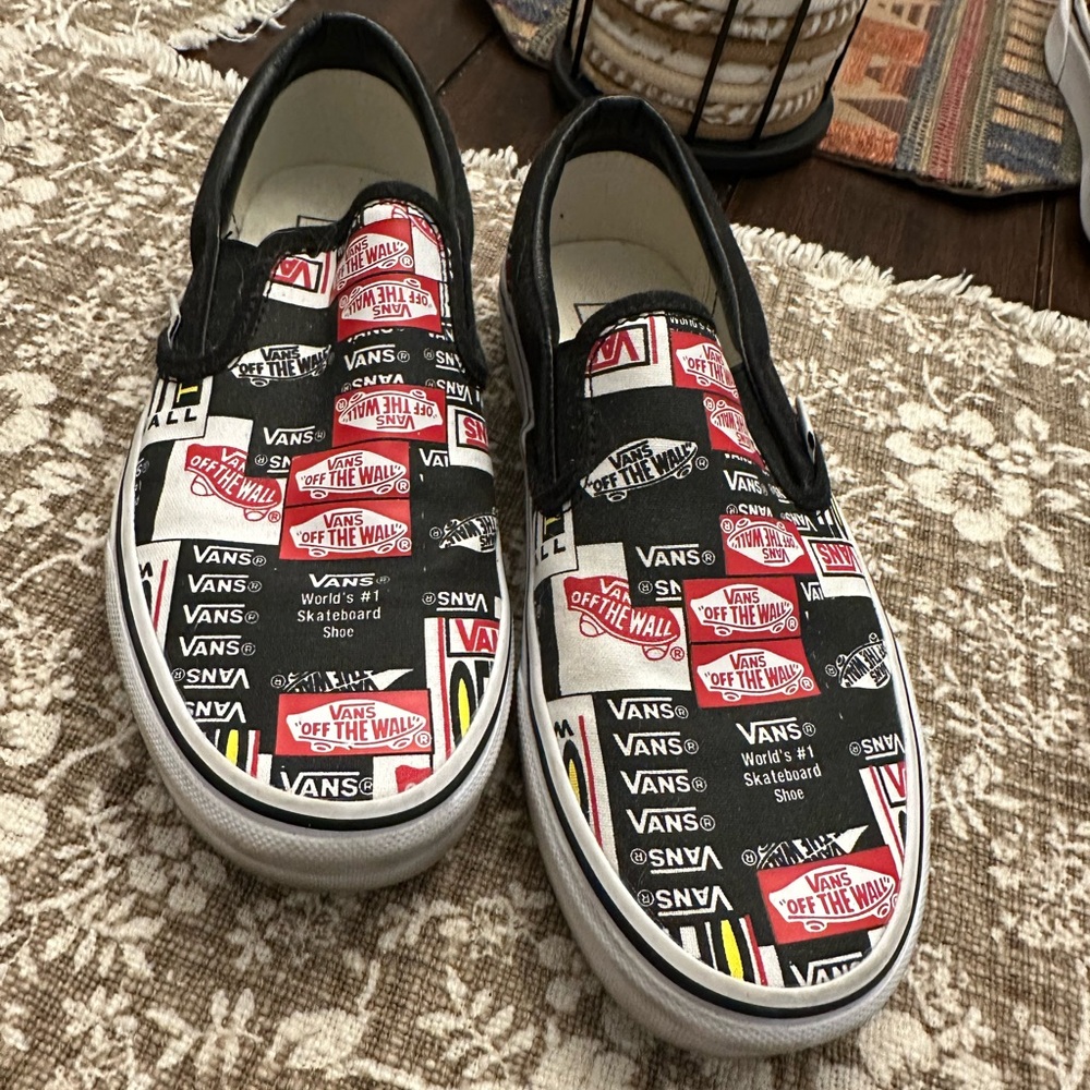Vans Black and White Slip-On Sneakers Bold Graphic Design